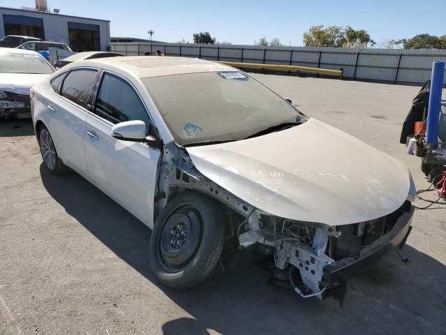 TOYOTA AVALON 2014 with VIN 4T1BK1EB4EU116705 - Photo from auction