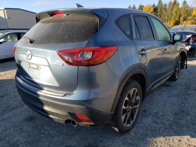 Photo 4 from auction – 2016 MAZDA CX-5 GT with VIN JM3KE4DY3G0690197
