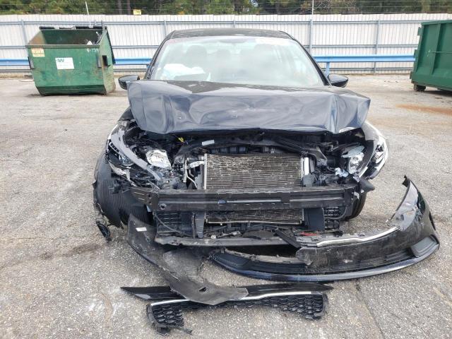 Photo 9 from auction – 2017 KIA FORTE LX with VIN 3KPFK4A76HE115891
