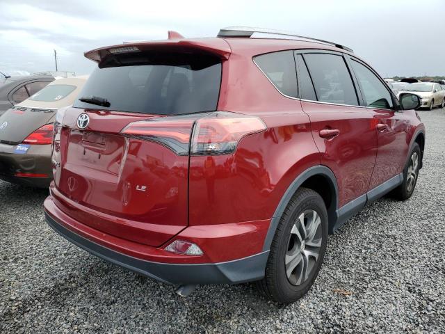 Photo 4 from auction – 2018 TOYOTA RAV4 LE with VIN 2T3ZFREV9JW494628