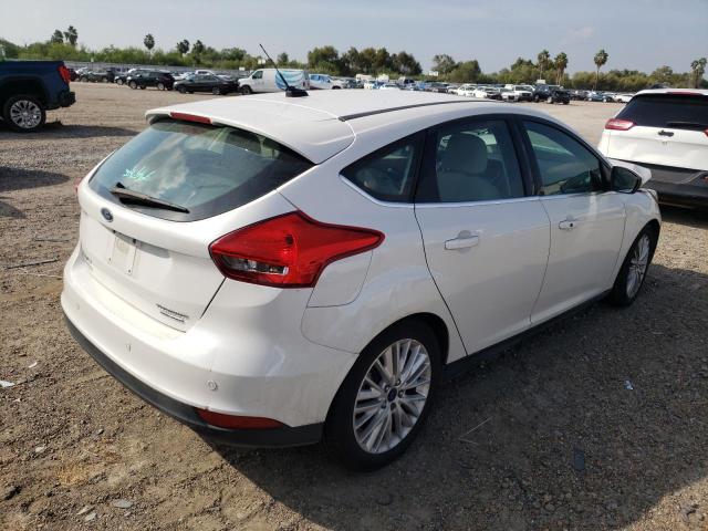 Photo 4 from auction – 2016 FORD FOCUS TITA with VIN 1FADP3N2XGL259926