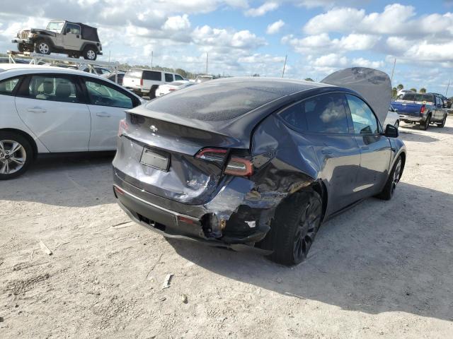 Photo 4 from auction – 2022 TESLA MODEL Y with VIN 7SAYGDEF0NF494634