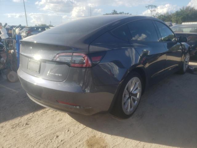 Photo 4 from auction – 2021 TESLA MODEL 3 with VIN 5YJ3E1EB6MF850172