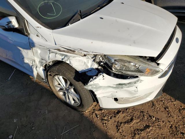 Photo 9 from auction – 2016 FORD FOCUS SE with VIN 1FADP3K21GL351883
