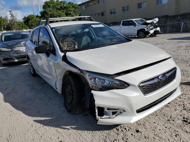 SUBARU IMPREZA 2019 with VIN 4S3GTAA64K3759802 - Photo from auction
