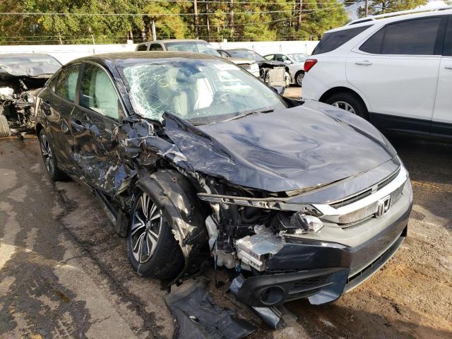 HONDA CIVIC EX 2018 with VIN 2HGFC1F32JH643117 - Photo from auction