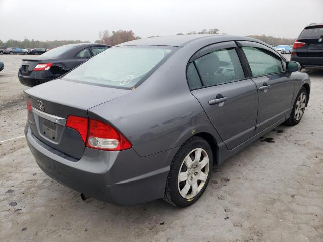 Photo 4 from auction – 2011 HONDA CIVIC LX with VIN 19XFA1F50BE019433
