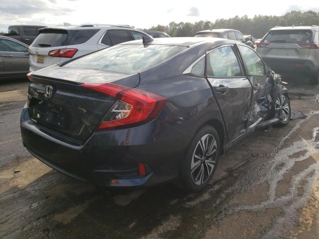 Photo 4 from auction – 2018 HONDA CIVIC EX with VIN 2HGFC1F32JH643117