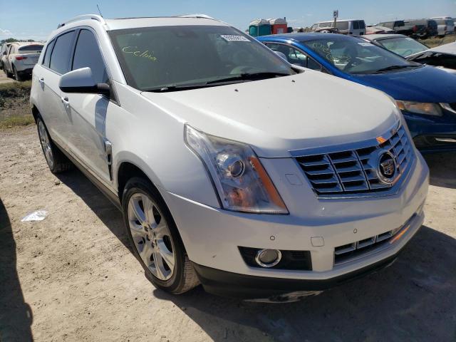 CADILLAC SRX PREMIU 2013 with VIN 3GYFNEE31DS617640 - Photo from auction