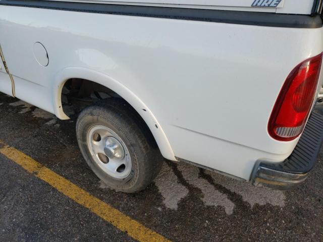 Photo 9 from auction – 2002 FORD F150 with VIN 1FTRX18W32NA72768