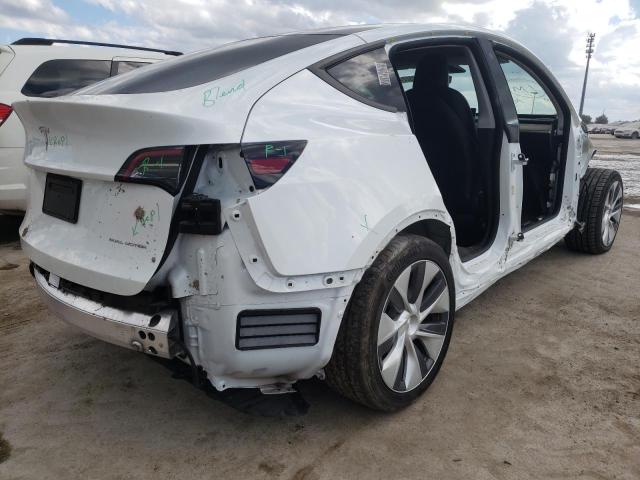Photo 4 from auction – 2021 TESLA MODEL Y with VIN 5YJYGDEE6MF083516