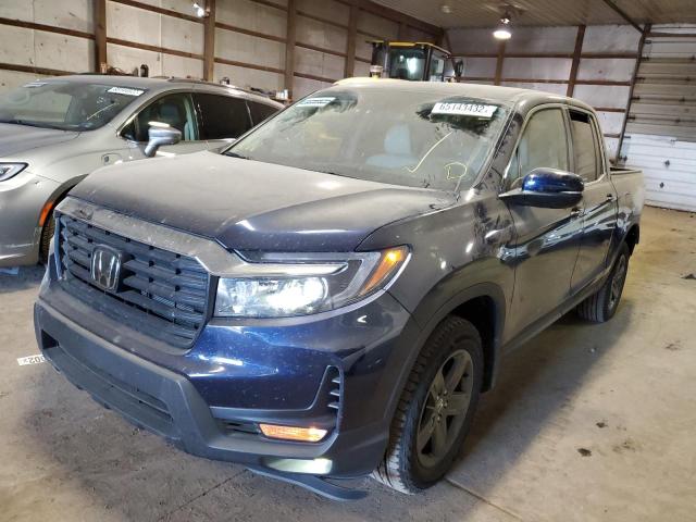 Photo 2 from auction – 2022 HONDA RIDGELINE with VIN 5FPYK3F5XNB026445