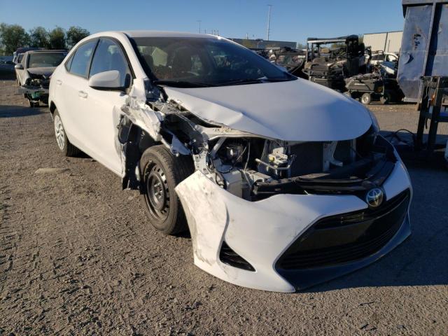 TOYOTA COROLLA L 2018 with VIN 5YFBURHE1JP811184 - Photo from auction