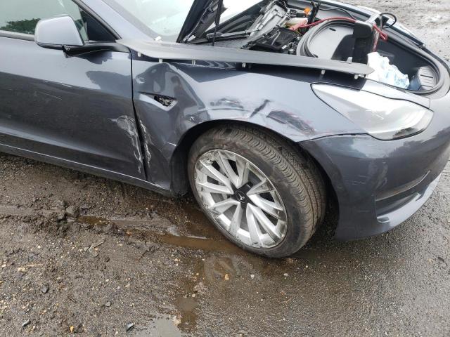 Photo 9 from auction – 2022 TESLA MODEL 3 with VIN 5YJ3E1EB7NF290180