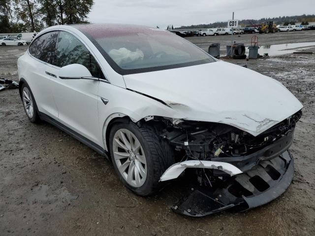 TESLA MODEL X 2016 with VIN 5YJXCDE21GF025928 - Photo from auction