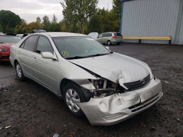 TOYOTA CAMRY LE 2004 with VIN 4T1BF32K84U069410 - Photo from auction