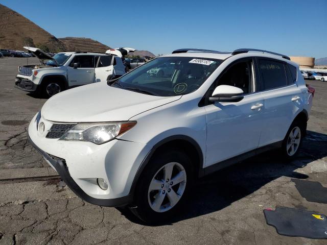Photo 2 from auction – 2014 TOYOTA RAV4 XLE with VIN JTMWFREV2EJ007177