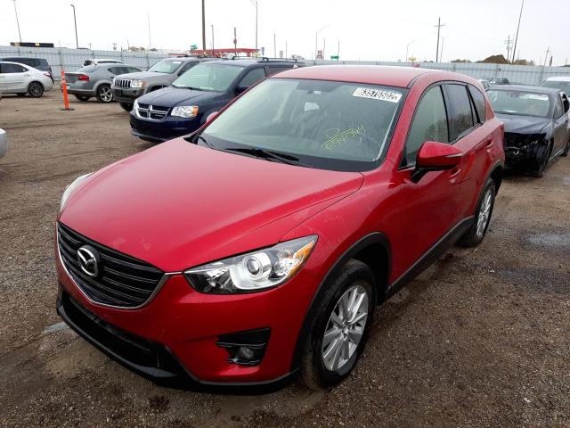 Photo 2 from auction – 2016 MAZDA CX-5 TOURI with VIN JM3KE4CY0G0694094