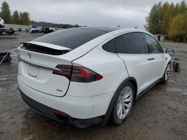 Photo 4 from auction – 2016 TESLA MODEL X with VIN 5YJXCDE21GF025928