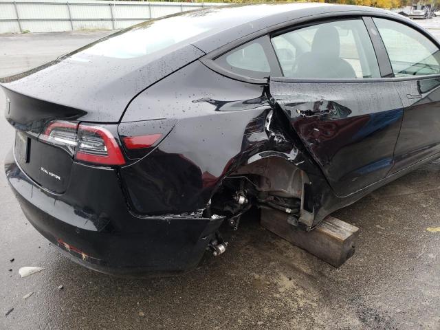 Photo 9 from auction – 2022 TESLA MODEL 3 with VIN 5YJ3E1EB6NF158849