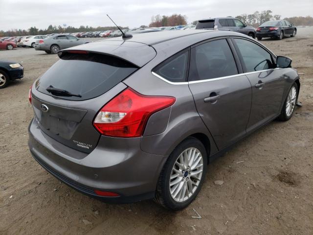 Photo 4 from auction – 2014 FORD FOCUS TITA with VIN 1FADP3N23EL320918