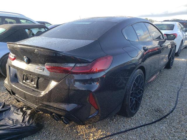 Photo 4 from auction – 2022 BMW M8 with VIN WBSGV0C06NCJ61365