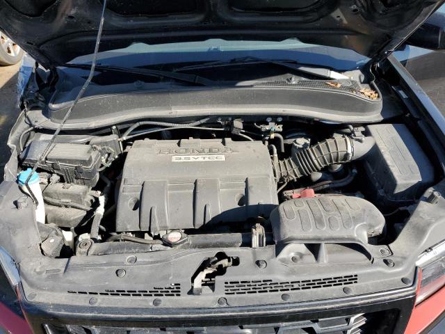 Photo 7 from auction – 2014 HONDA RIDGELINE with VIN 5FPYK1F7XEB012549