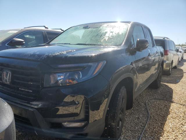 Photo 2 from auction – 2022 HONDA RIDGELINE with VIN 5FPYK3F81NB014114