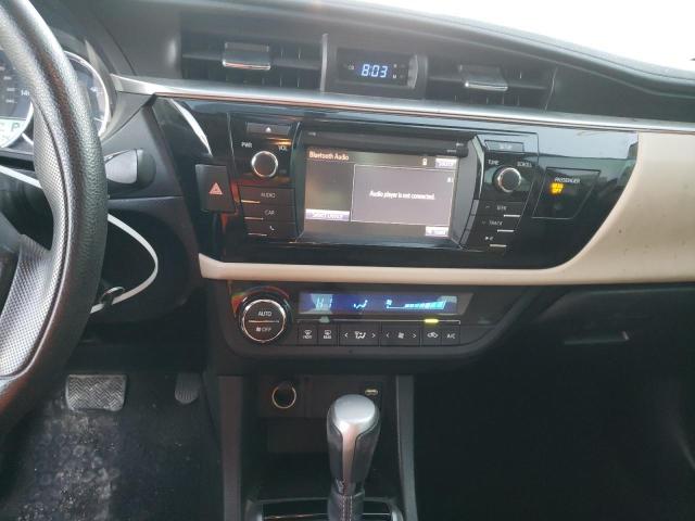 Photo 9 from auction – 2015 TOYOTA COROLLA L with VIN 5YFBURHE6FP288199