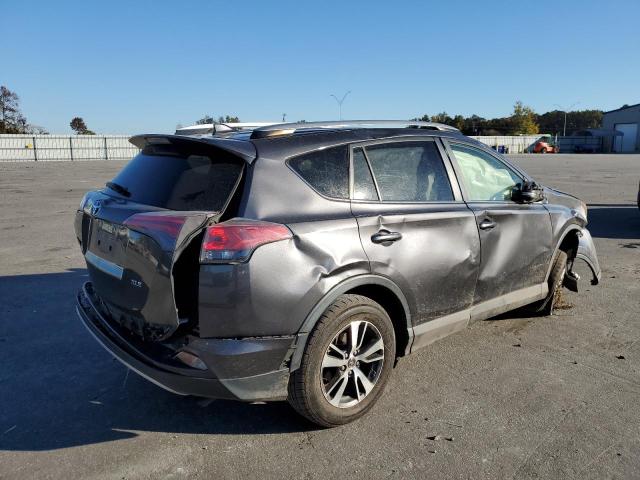 Photo 4 from auction – 2017 TOYOTA RAV4 XLE with VIN JTMWFREV5HJ711216