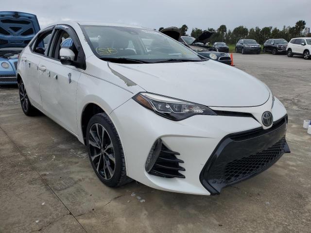 TOYOTA COROLLA L 2017 with VIN 5YFBURHE2HP584565 - Photo from auction