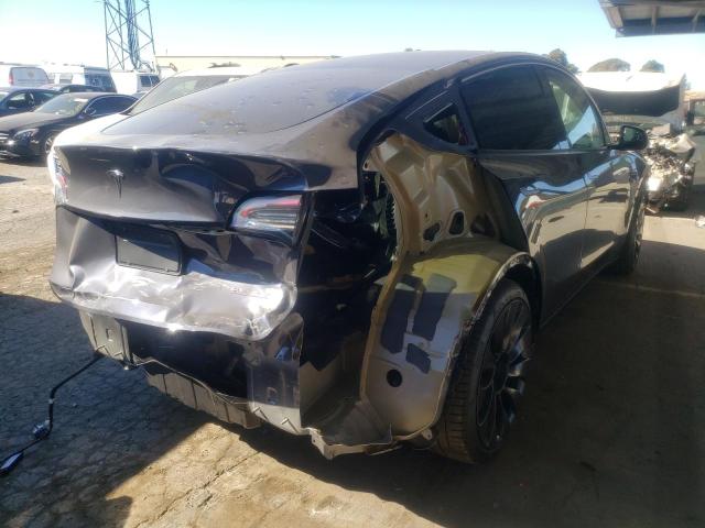 Photo 4 from auction – 2022 TESLA MODEL Y with VIN 7SAYGDEF9NF397805