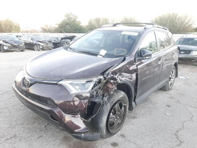 Photo 2 from auction – 2018 TOYOTA RAV4 LE with VIN 2T3ZFREV7JW475561