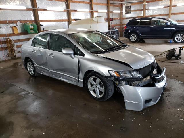 Photo 1 from auction – 2011 HONDA CIVIC LX with VIN 19XFA1F5XBE036031