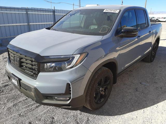 Photo 2 from auction – 2022 HONDA RIDGELINE with VIN 5FPYK3F8XNB032630