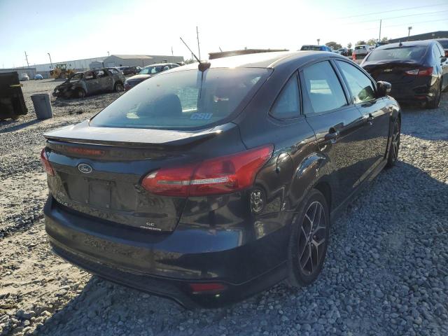 Photo 4 from auction – 2016 FORD FOCUS SE with VIN 1FADP3F25GL201088