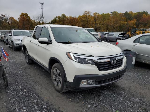 HONDA RIDGELINE 2018 with VIN 5FPYK3F77JB005855 - Photo from auction