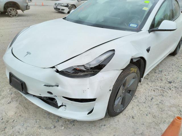 Photo 9 from auction – 2021 TESLA MODEL 3 with VIN 5YJ3E1EA2MF094556