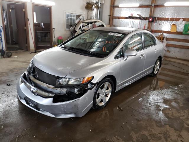 Photo 2 from auction – 2011 HONDA CIVIC LX with VIN 19XFA1F5XBE036031