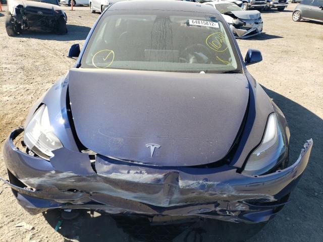 Photo 7 from auction – 2022 TESLA MODEL 3 with VIN 5YJ3E1EC7NF208487