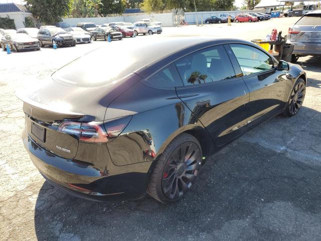 Photo 4 from auction – 2022 TESLA MODEL 3 with VIN 5YJ3E1EC6NF265750