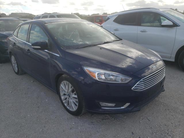 FORD FOCUS TITA 2017 with VIN 1FADP3J28HL317488 - Photo from auction