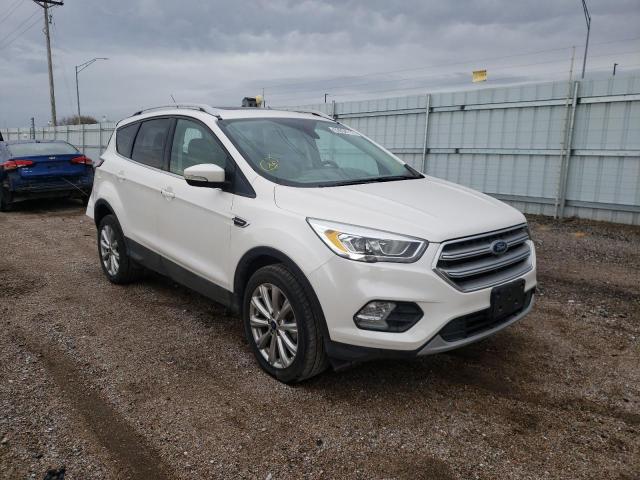 FORD ESCAPE TIT 2017 with VIN 1FMCU9J98HUB80265 - Photo from auction