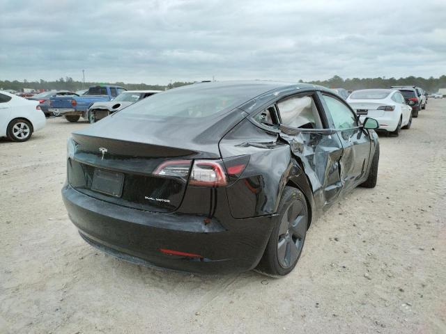 Photo 4 from auction – 2022 TESLA MODEL 3 with VIN 5YJ3E1EB7NF190998