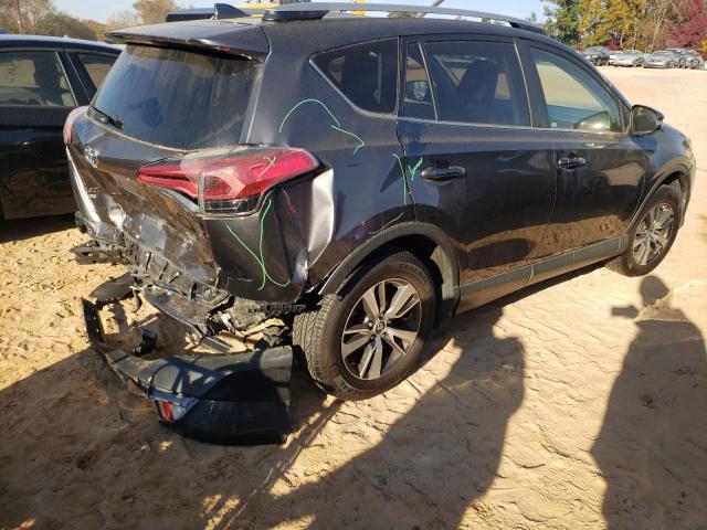 Photo 4 from auction – 2017 TOYOTA RAV4 XLE with VIN JTMWFREV9HJ705628