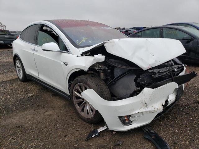 TESLA MODEL X 2017 with VIN 5YJXCBE2XHF059663 - Photo from auction