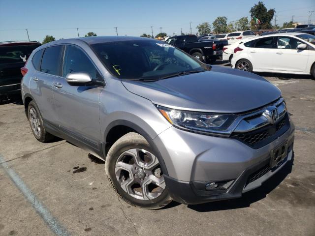 HONDA CR-V EX 2018 with VIN 7FARW1H59JE009265 - Photo from auction