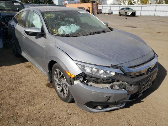 HONDA CIVIC LX 2018 with VIN 2HGFC2F64JH017164 - Photo from auction