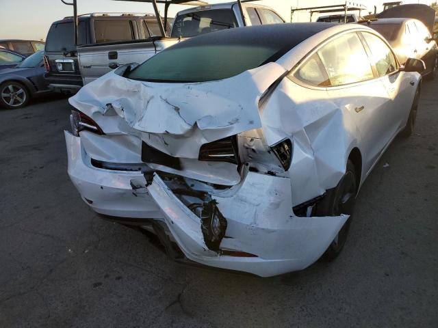 Photo 4 from auction – 2022 TESLA MODEL 3 with VIN 5YJ3E1EA2NF351071