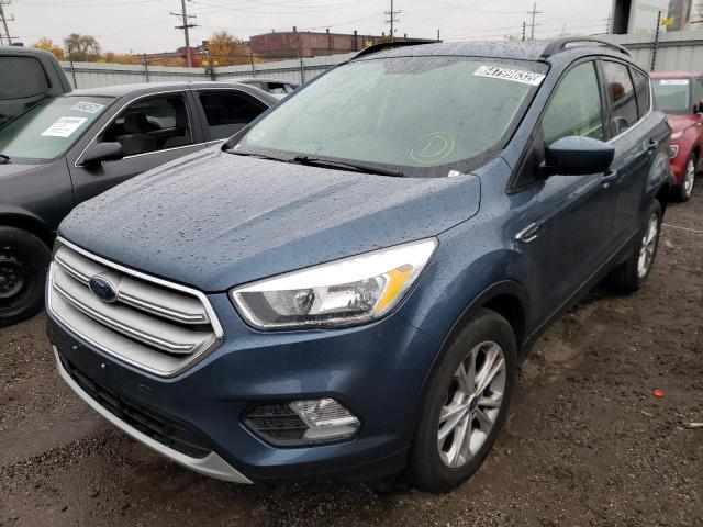 FORD ESCAPE SE 2018 with VIN 1FMCU0GD7JUC85599 - Photo from auction